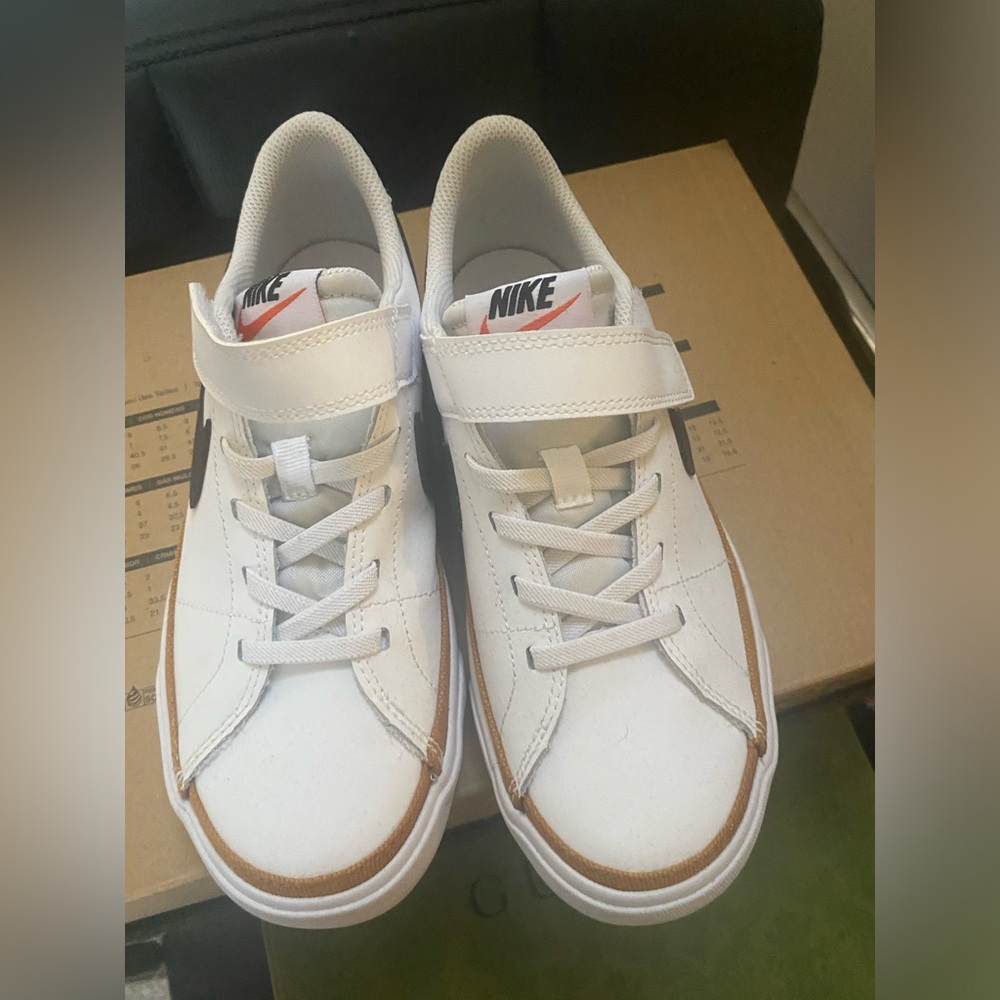 Kid size New Nike slip on sneakers